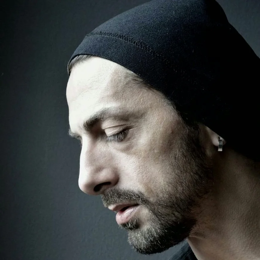Milan Andov, turning from profile toward the camera